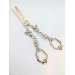 A pair of Victorian silver gilt grape scissors. A makers mark only for Yapp & Woodward. 103gms.