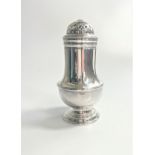 A George II Sterling Silver Castor. Samuel Wood. London 1727. 13.5cm high. 177.6 grams.