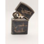 A sterling silver cigarette lighter stamped Siam sterling