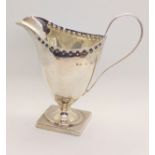 A late Victorian Georgian style cream jug, Nathan & Hayes. Birmingham 1897. 12cm high. 78gms.