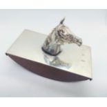 A modern silver mounted ink blotter decorated with a cast horse's head.