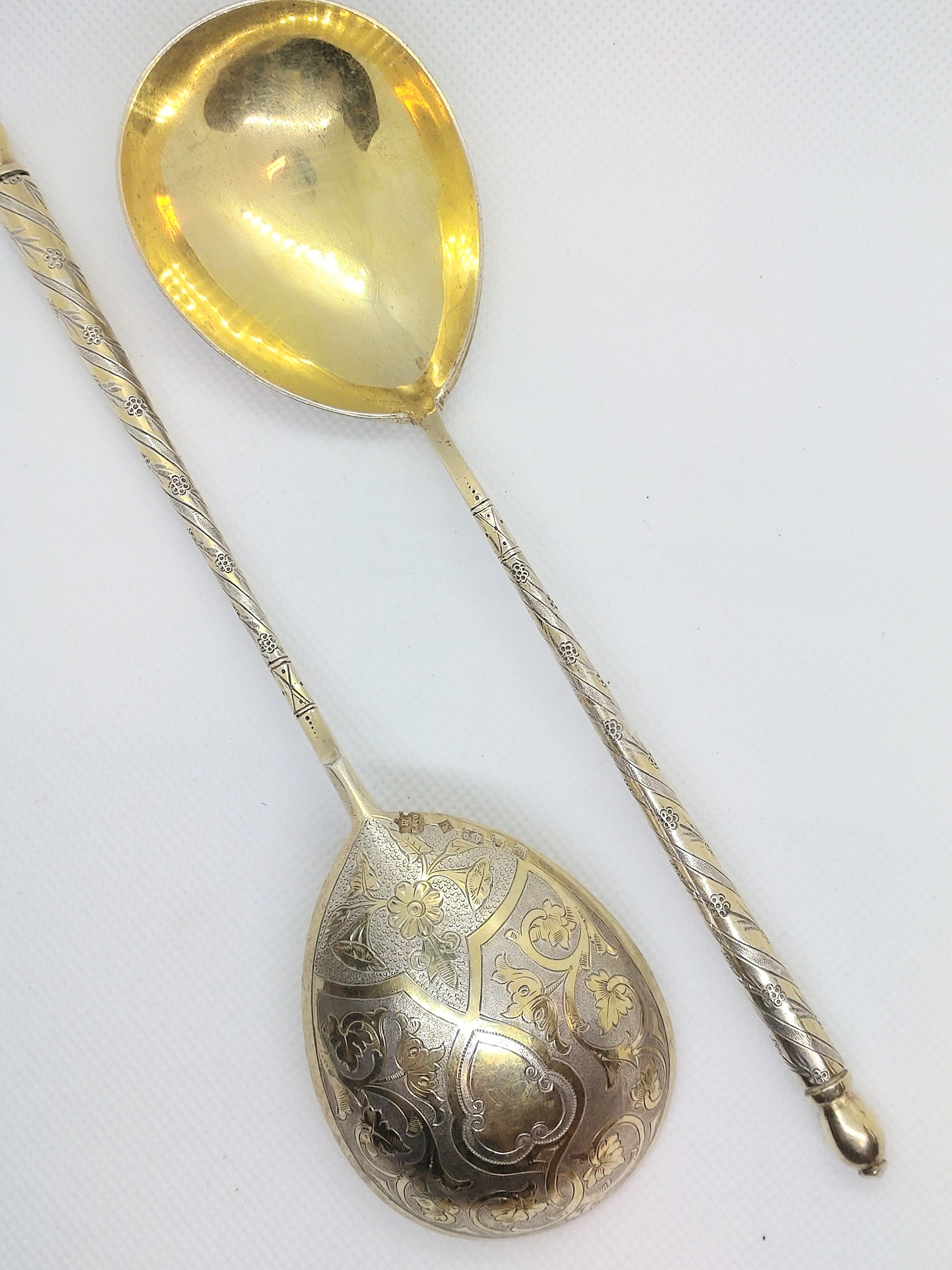 A pair of Elkington and Co. silver-plated gilt spoons. - Image 2 of 3