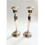 A Pair of sterling Silver Table candlesticks. Birmingham 1973. 25.5cm high. Loaded.