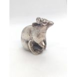 A rare sterling silver cast pepperette in the form of a mouse. Import marks. late 19th century.