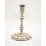 A Victorian sterling silver taper stick in Georgian style. London 1850. 11cm high. 115gms.