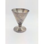 A small sterling silver cup Birmingham 1985. 70gms.