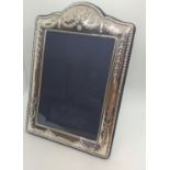 A silver mounted photograph frame. Modern. Sheffiled hallmarks. 18cm high.