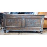 A late 17th century carved coffer. 47 x 105 x 454cm