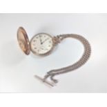 A 9 carat Gold Hunting cased pocket Watch. Birmingham 1926. With chain. 94grams (all in)