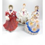 Three Royal Doulton ladies including Rosemary, Country Rose, and The Skater. With boxes. 20cm to