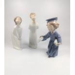 A pair of Lladro figures of girls and a scholar 19cm to 20cm high, two with glue repair. (3)