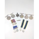 WW1I medals plus dress medals and single World war I medal. Un-named