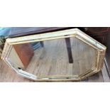 An octagonal mirror. 110 x 77cm