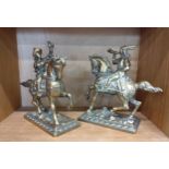 Two brass horse and riders