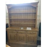 An antiques Pine Welsh dresser 200 x 155 x 46cm.