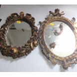 Two Antique Carved Wood. 0val mirrors