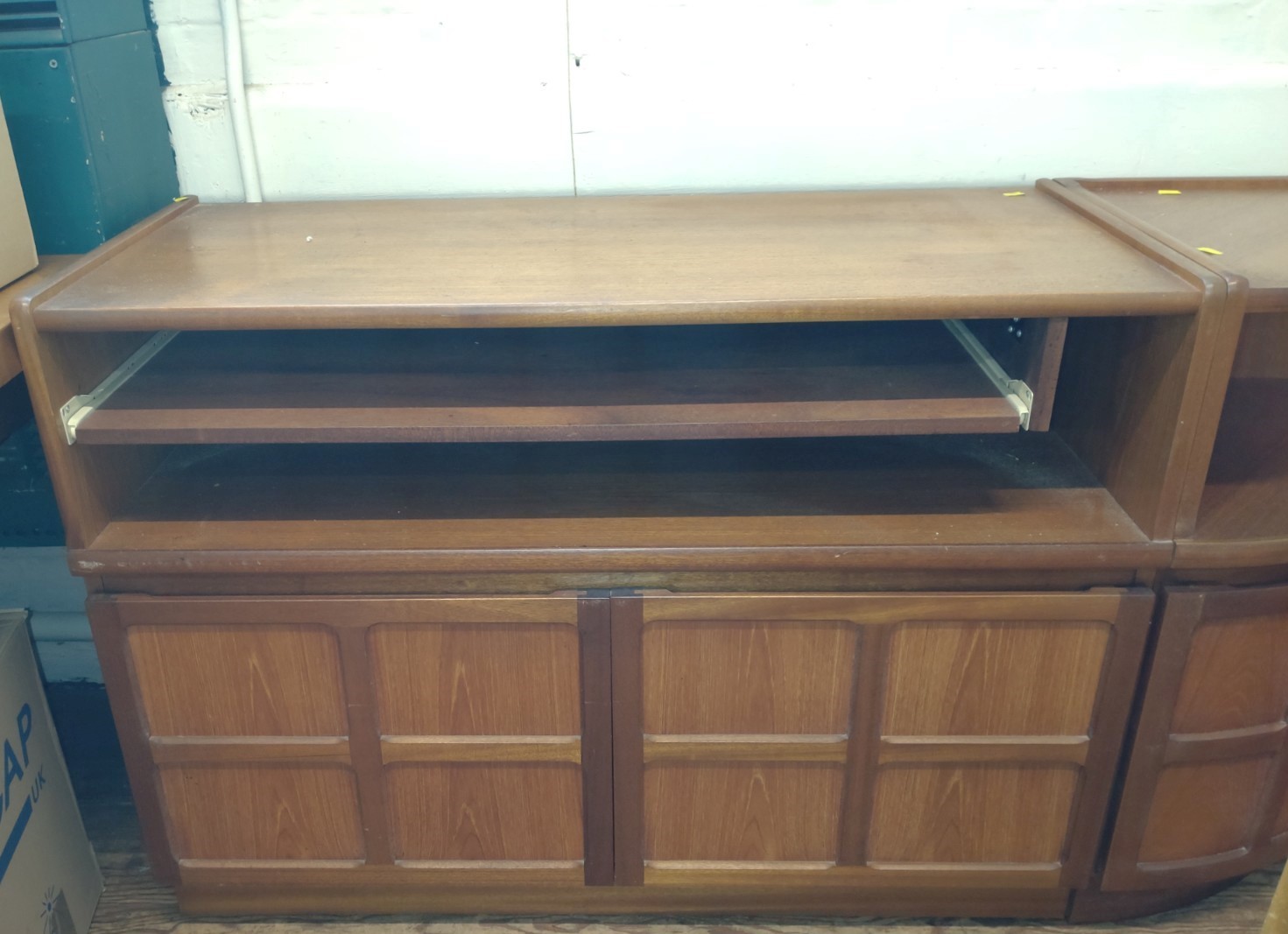 A mid-century Mahogany TV cabinet. Circa 1960.