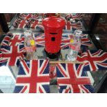 A Honiton Pottery Pillar Post Box money bank 21cm, two Coca-Cola 1981 Royal Wedding Commemorative