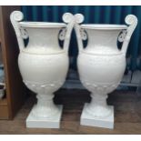 Two ceramic urns