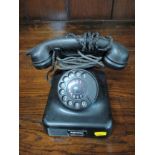 A Vintage Bakelite telephone.