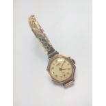A 9ct gold lady's dress watch. 8 grams (all in)
