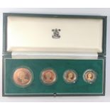 A 1980 Gold proof set. £5 to Half sovereign. Fitted case.