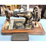 An antique Singer sewing machine. Circa 1900.