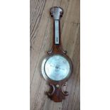 A Victorian onion top mahogany mercury reservoir barometer