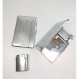 A cigarette case, a lighter, and a cigarette case with a lighter