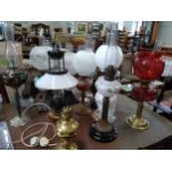 A collection of oil lamps (fifteen in total)