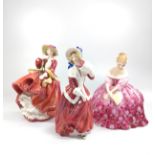 Three Royal Doulton ladies including Top of the Hill, Christmas Morn, and Victoria. With boxes. 15cm