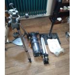 A Celeston Aster Master Series Telescope and tripod with instructions.