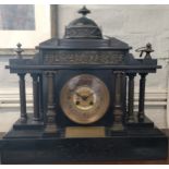A Belgium slate mantel clock. Circa 1901 of architectural form