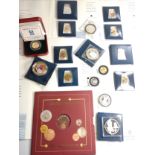 A half sovereign and limited edition coins. In sealed containers. (a lot)