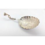 A Dutch 19th century embossed spoon. 13cm long. 26gms.