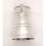 A silver pepper grinder inscribed to body.