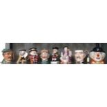 Eight character jugs including Gibsons Neville Chamberlain, Sandland Toby Ale and Beefeater 14cm