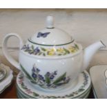 A Royal Worcester 'Herbs' pattern dinner service anbd teapot with sugar bowl and milk jug. (39)