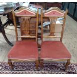 A pair of Edwardian Salon chairs. With splat backs.