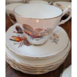 Argyle porcelain dinner service with Flying Pheasants pattern. (42)