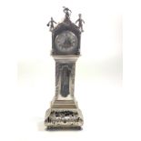 A Dutch silver desk time piece in the form of a long case clock late 19th century with an English