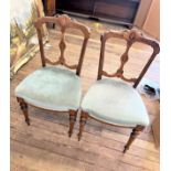 A Pair of Victorian Dining Chairs. With over-stuffed seats.