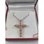 An 18ct rose gold RBS diamond cross pendant with rose gold dipped silver chain, boxed. Diamnds 2.