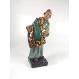 A Royal Doulton Figure of a Carpet Seller