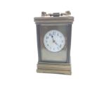 A Victorian Brass Carriage Clock. Circa 1890. The white enamel dial with Arabic Numerals. Striking