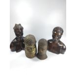 Four African busts. 20th century.