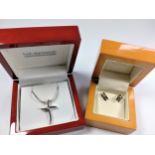 A Hot Diamond necklace and pendant in a box, together with a pair of white ice earrings.