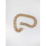 A Tiffany 14 carat gold bracelet. Stamped Tiffany and14K. 21cm long. 28.14