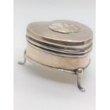 A heart shaped sterling silver ring box. Birmingham 1910. With silk interior. 4cm long.