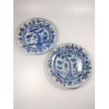 A pair of Chinese blue and white porcelain 18th century plates with tree and bamboo pattern and